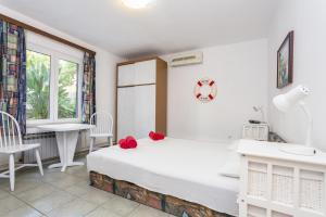 Кровать или кровати в номере Lussino Accommodation
