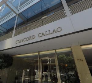 un edificio con un cartel que diga concord calico en Concord Callao en Buenos Aires
