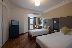 Voodi või voodid majutusasutuse YWCA Fort Canning toas
