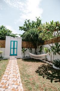 Ein Garten an der Unterkunft Bamboo Bungalows