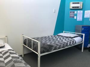 YHA Nelson客房内的一张或多张床位