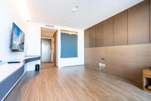 TV a/nebo společenská místnost v ubytování Hotel Whistlelark Jeju