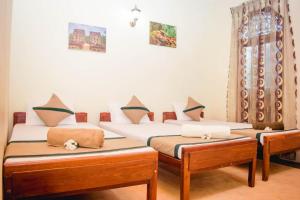 Krevet ili kreveti u jedinici u objektu 4ty two Homestay Galle