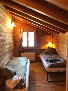 Krevet ili kreveti u jedinici u okviru objekta Chalet Beauroc
