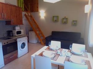 Kuchyň nebo kuchyňský kout v ubytování Apartment Gran Sol El Tarter