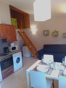 Kuchyň nebo kuchyňský kout v ubytování Apartment Gran Sol El Tarter