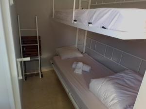 Postel nebo postele na pokoji v ubytování Apartment Gran Sol El Tarter