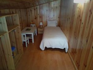 Postel nebo postele na pokoji v ubytování Apartment Gran Sol El Tarter