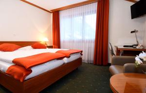 Postel nebo postele na pokoji v ubytování Hotel Elite