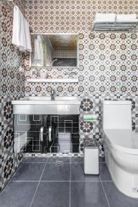 Koupelna v ubytování Mambo Boutique Hotel