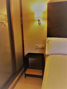 Postel nebo postele na pokoji v ubytování Chillout Hotel Tres Mares
