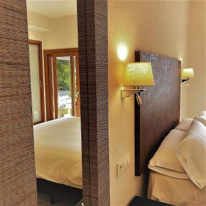 Postel nebo postele na pokoji v ubytování Chillout Hotel Tres Mares