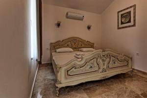 a bedroom with an ornate bed in a room at Dalya Life in Göcek