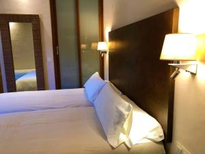 Postel nebo postele na pokoji v ubytování Chillout Hotel Tres Mares