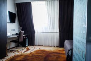 TV a/nebo společenská místnost v ubytování Park Hotel