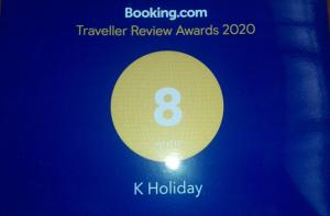 a poster with the number eight on a blue background at K Holiday in Tissamaharama