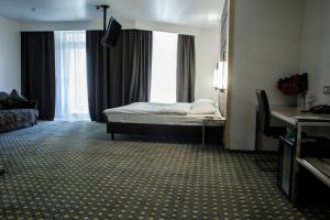 Postel nebo postele na pokoji v ubytování Park Hotel