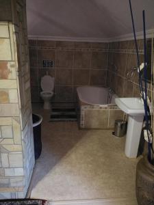 Koupelna v ubytování Bougain Villa Guesthouse