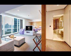 TV o dispositivi per l'intrattenimento presso The Act Hotel Sharjah
