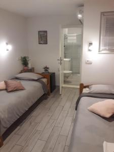Postel nebo postele na pokoji v ubytování Apartments Marin
