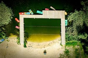 an overhead view of a bridge over a body of water at Folwark Łękuk in Łękuk Mały
