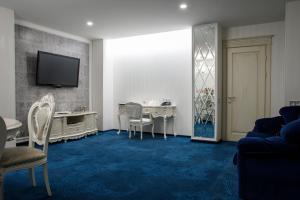 TV a/nebo společenská místnost v ubytování Park Hotel