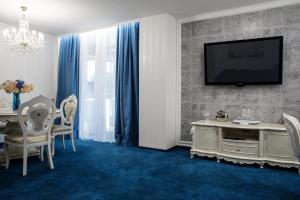 TV a/nebo společenská místnost v ubytování Park Hotel