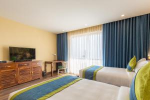 Letto o letti in una camera di Aagantuk Resort