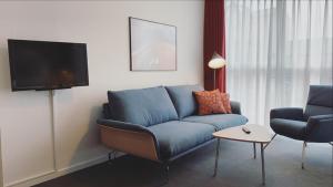 TV a/nebo společenská místnost v ubytování Skaga Hotel