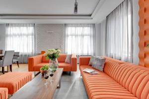 Гостиная зона в Premium Residence by Welcome Apartment