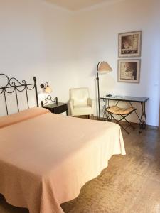 Postel nebo postele na pokoji v ubytování Hotel Plaza Escribano + 24 fotografií