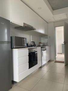 Coral Point Apartment - Sibaya, Umhlanga tesisinde mutfak veya mini mutfak
