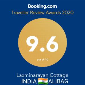 a flyer for a travel review awards with a yellow circle at Laxminarayan Cottage in Alibaug