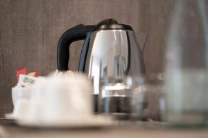 a tea kettle sitting on top of a table at Attica 21 Barcelona Mar in Barcelona