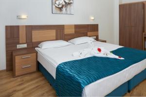 En eller flere senge i et værelse på Paradise Beach Residence - Ultra All Inclusive