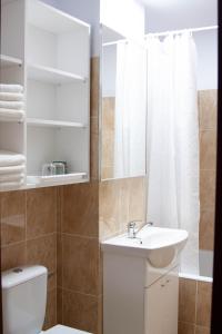 Ένα μπάνιο στο 21 Cozy Apartament