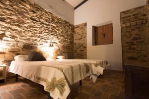 Posteľ alebo postele v izbe v ubytovaní Finca Valle Corchoso