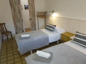 Postel nebo postele na pokoji v ubytování Casa Mineta