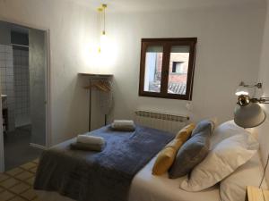 Postel nebo postele na pokoji v ubytování Casa Mineta