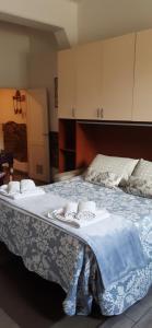 Voodi või voodid majutusasutuse La Vecchia Firenze toas