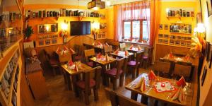 an overhead view of a restaurant with tables and chairs at HOTEL BRITANNIA VSETÍN in Vsetín