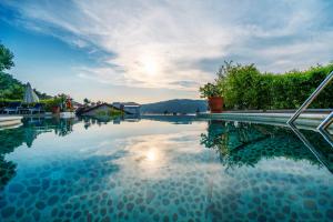 a large pool of water with the sky at Hotel Unique-Boutique Class - Adults Only in Fethiye
