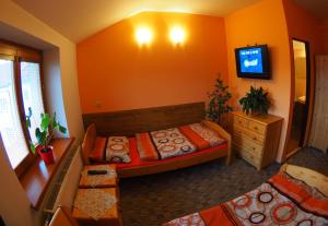 Voodi või voodid majutusasutuse HOTEL BRITANNIA VSETÍN toas