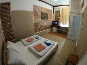 Postel nebo postele na pokoji v ubytování Sun Hotel