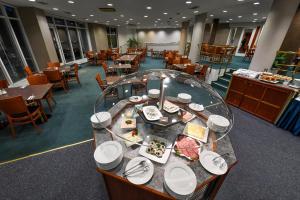 Restoran või mõni muu söögikoht majutusasutuses Hotel Jana