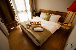 Postelja oz. postelje v sobi nastanitve Hotel Cordata