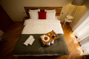 Postelja oz. postelje v sobi nastanitve Hotel Cordata