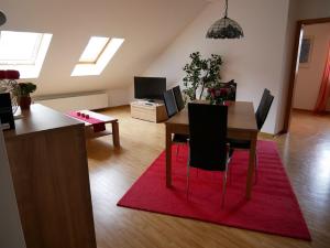 Posezení v ubytování Weingut & Ferienwohnungen Kirch + 8 fotografií