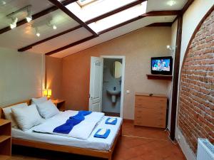 TV a/nebo společenská místnost v ubytování Sun Hotel