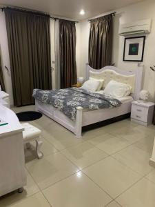 Katil atau katil-katil dalam bilik di Greens Manor VI